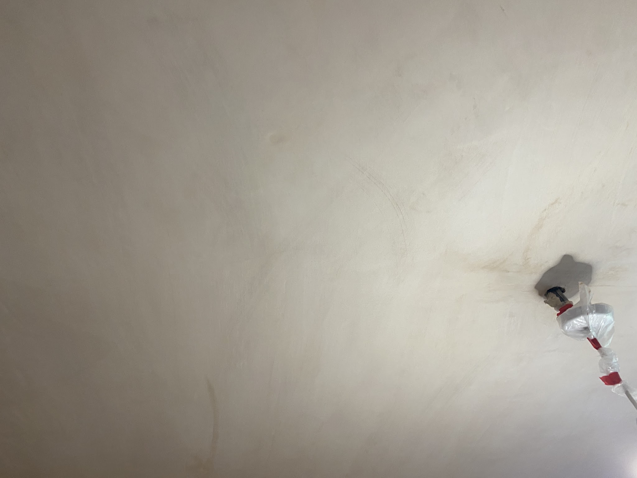 Close-up of the finished ceiling, smooth where the artex used to be